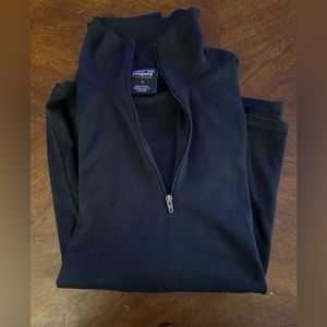 Women’s black Capilene Patagonia pullover.